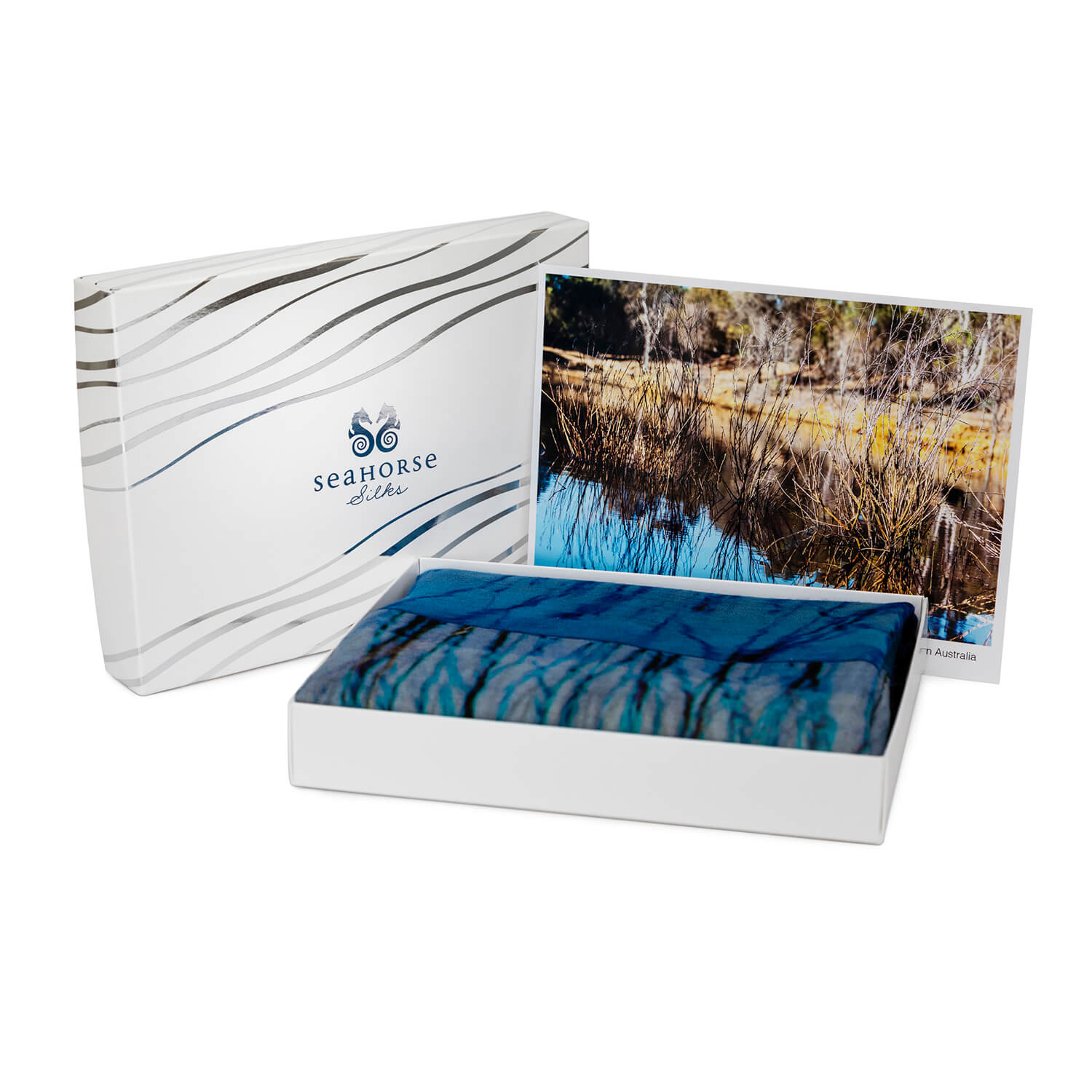 the dam cashmere wool scarf by seahorse silks with gift box and postcard