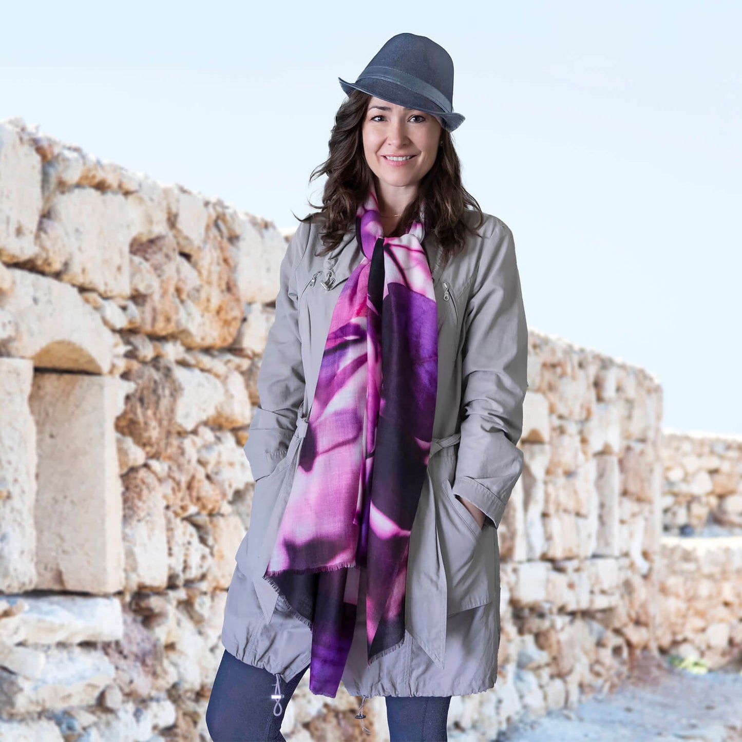 lady in trench coat wearing purple leaves cashmere wool scarf