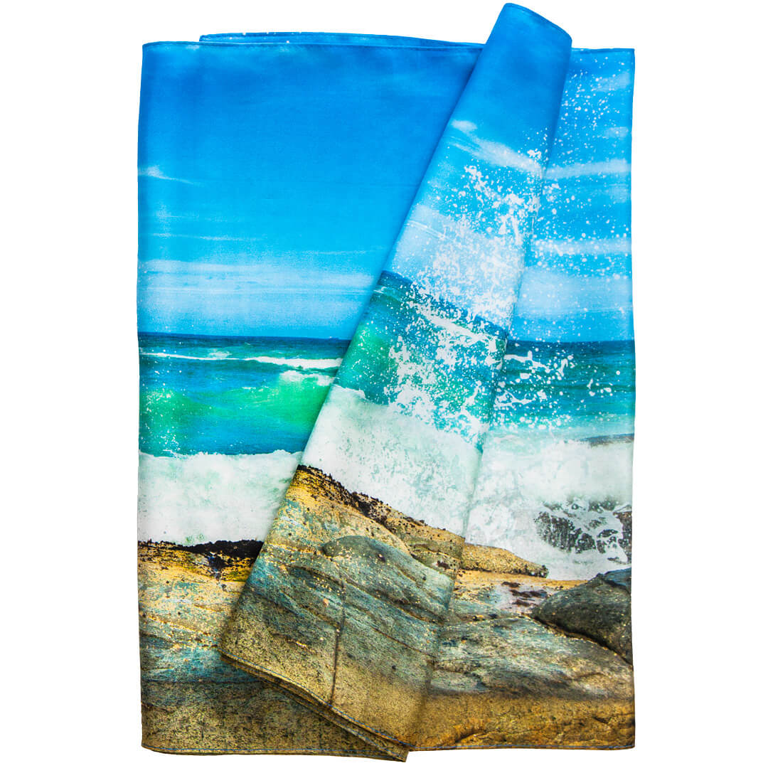 wearable art silk scarf of waves splashing on rocks by seahorse silks