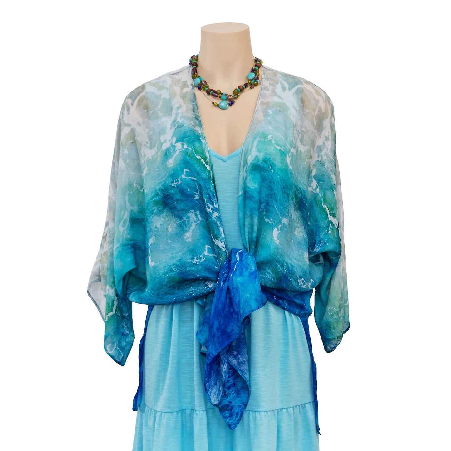 barchetta waterfall jacket tied in front over blue dress