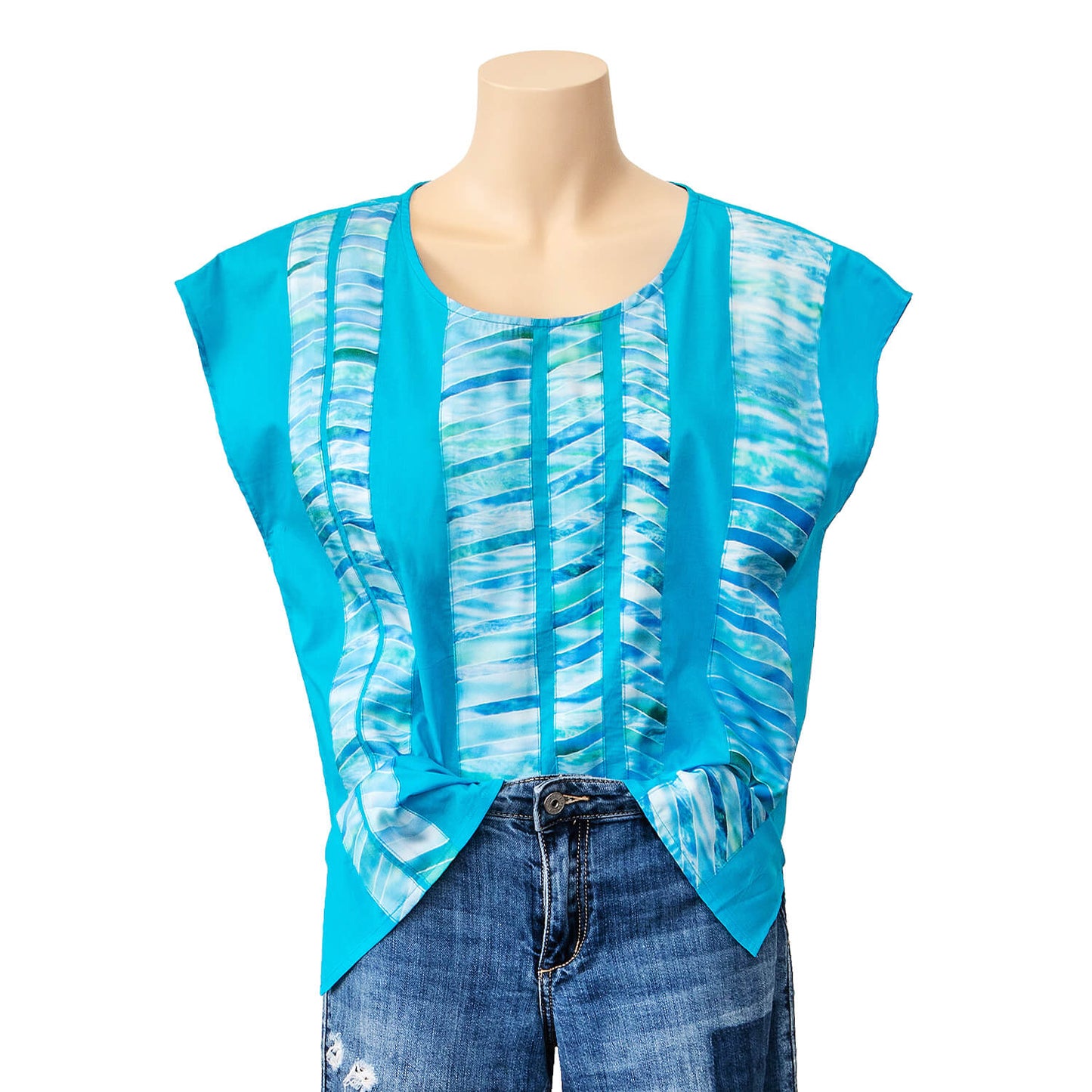 bits of florida aqua blue loose top by seahorse silks tucked into jeans