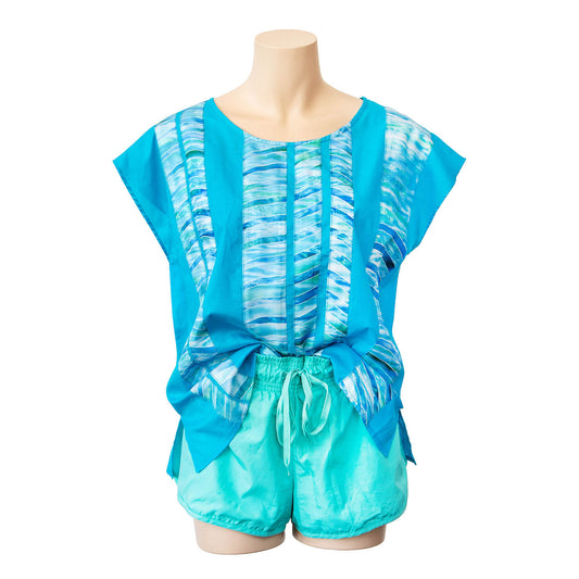 bits of florida cotton & silk top tucked into aqua blue shorts