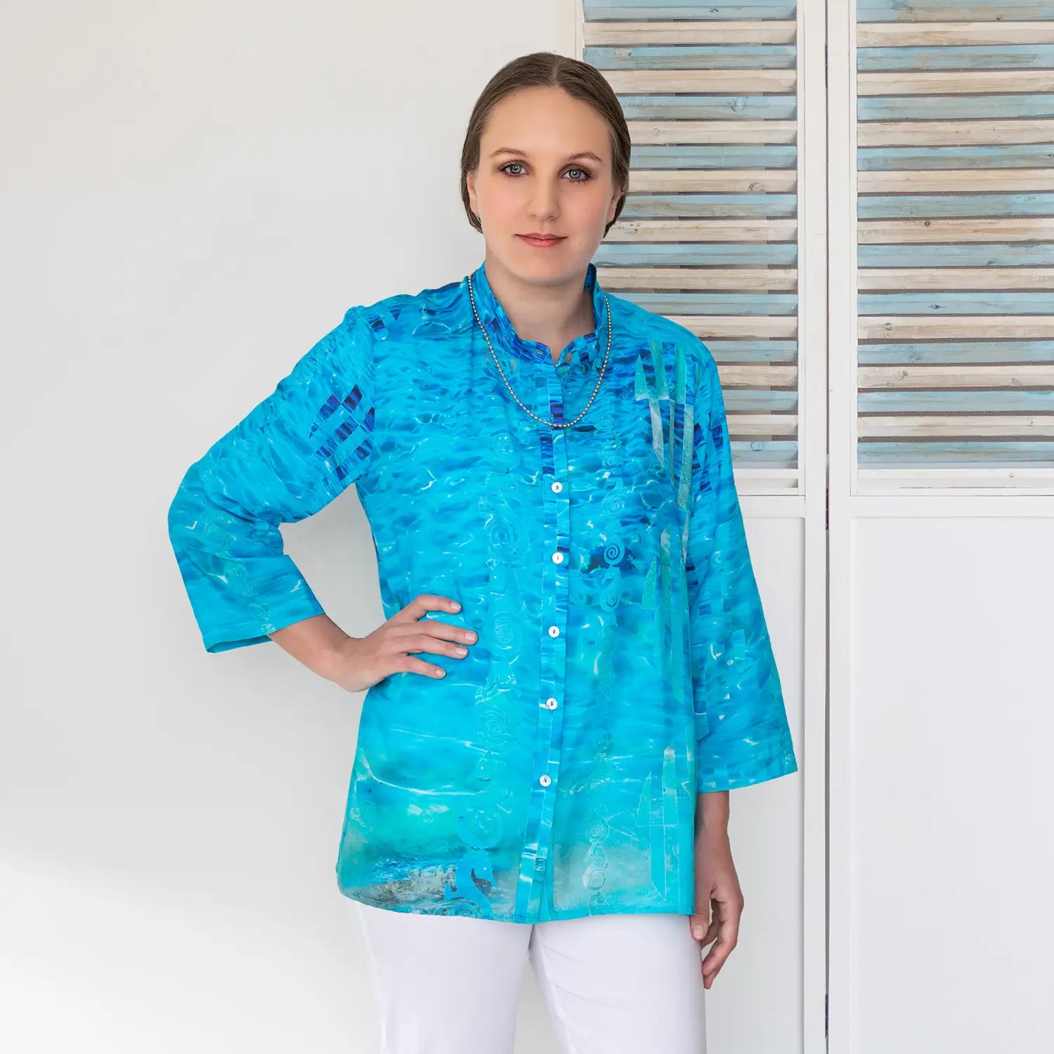 clear blue silk cotton ladies shirt with white pants by seahorse silks