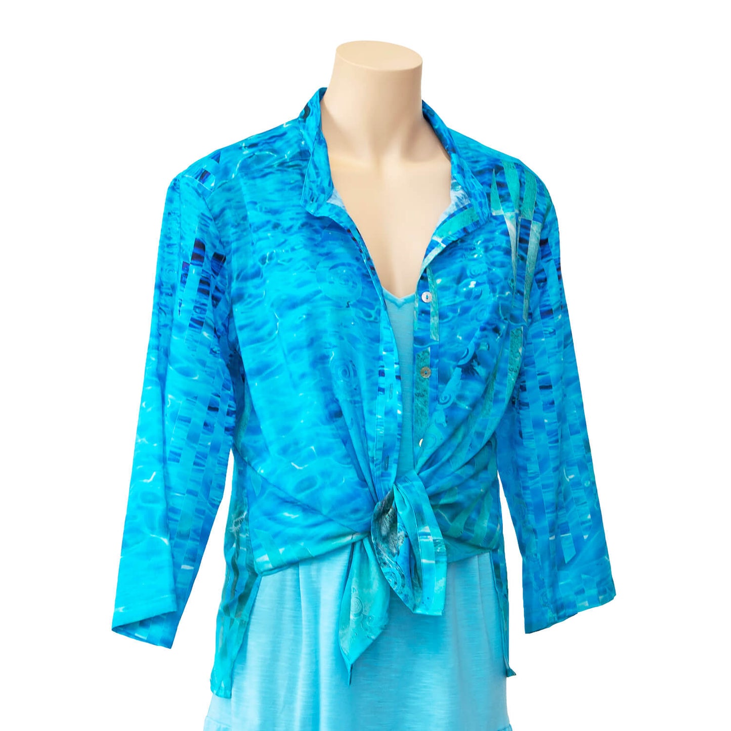 clear blue cotton silk ladies shirt tied in front over blue dress by seahorse silks