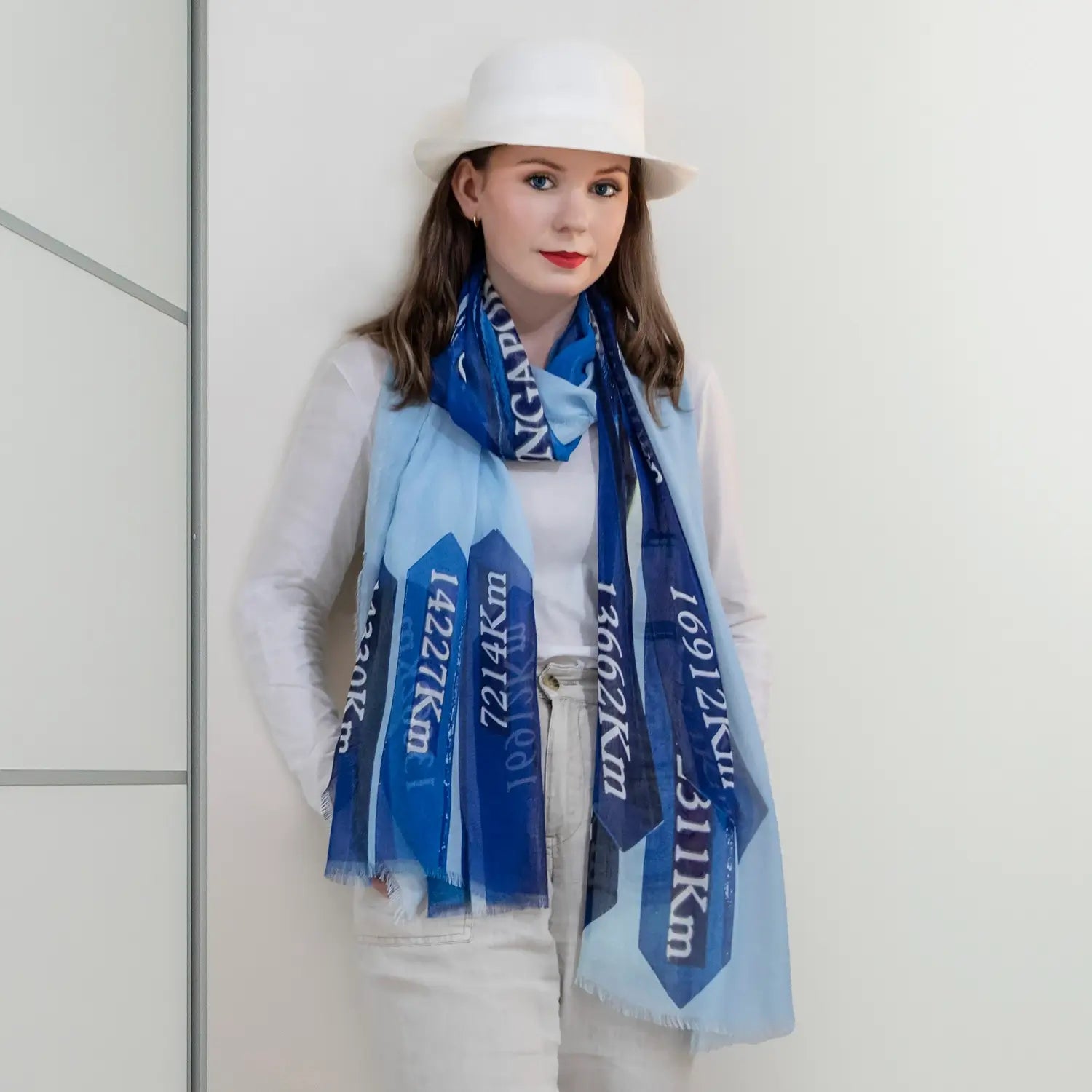 lets travel blue scarf with white top by seahorse silks