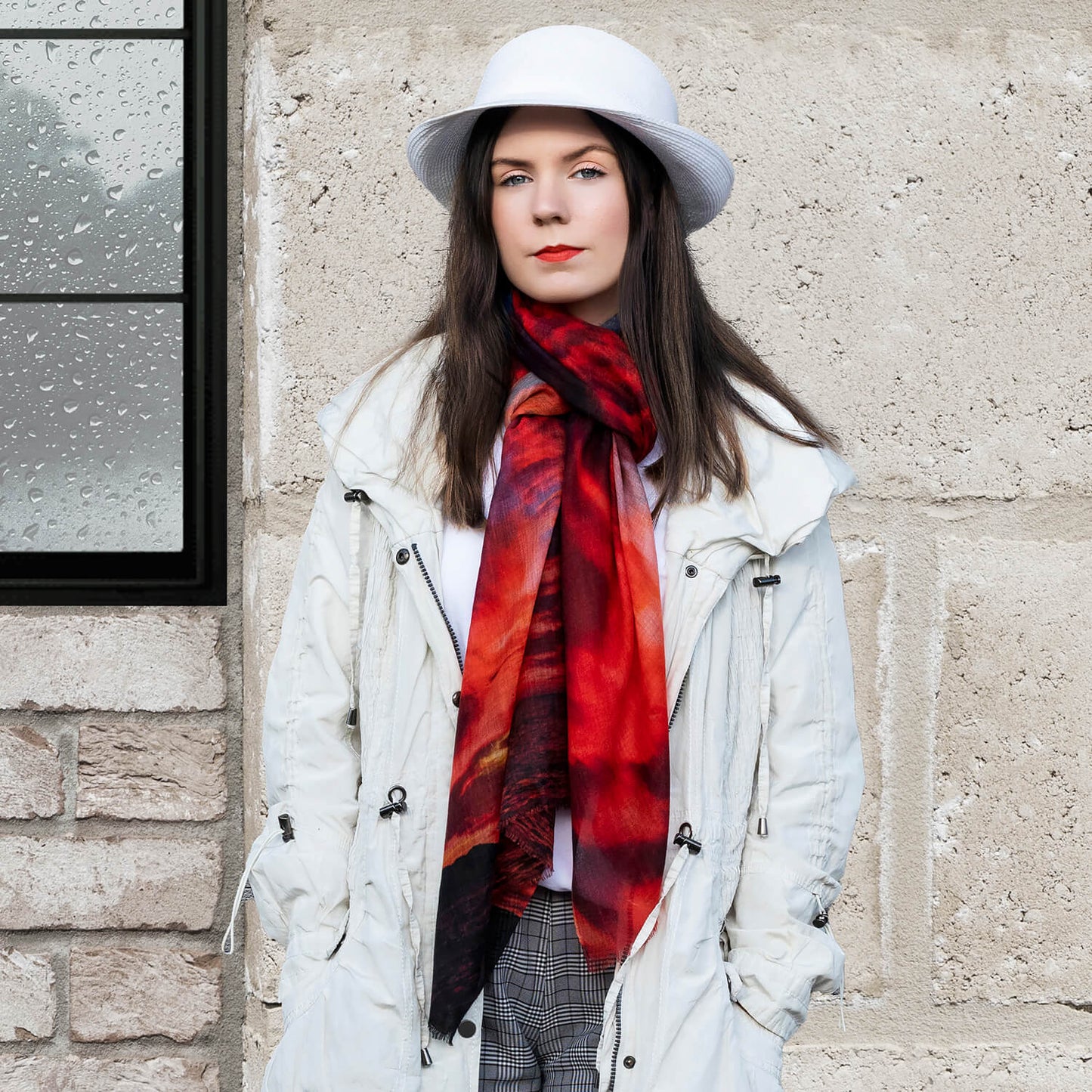 red hot cashmere and merino wool scarf with white coat by seahorse silks