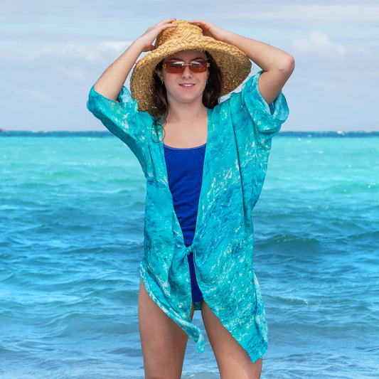 turquoise bay waterfall jacket over blue bathers at the beach