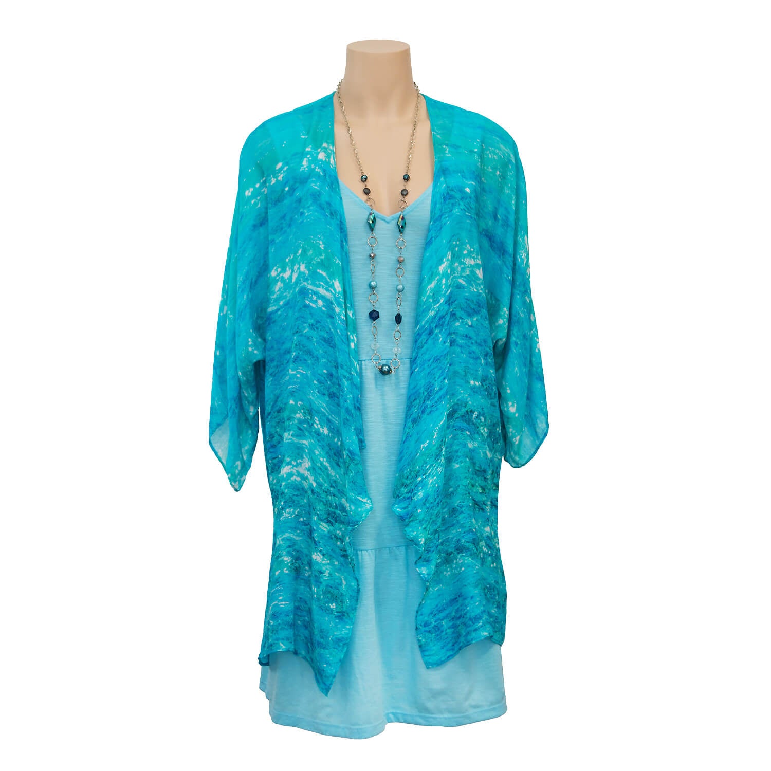 turquoise bay waterfall jacket over blue dress by seahorse silks australia
