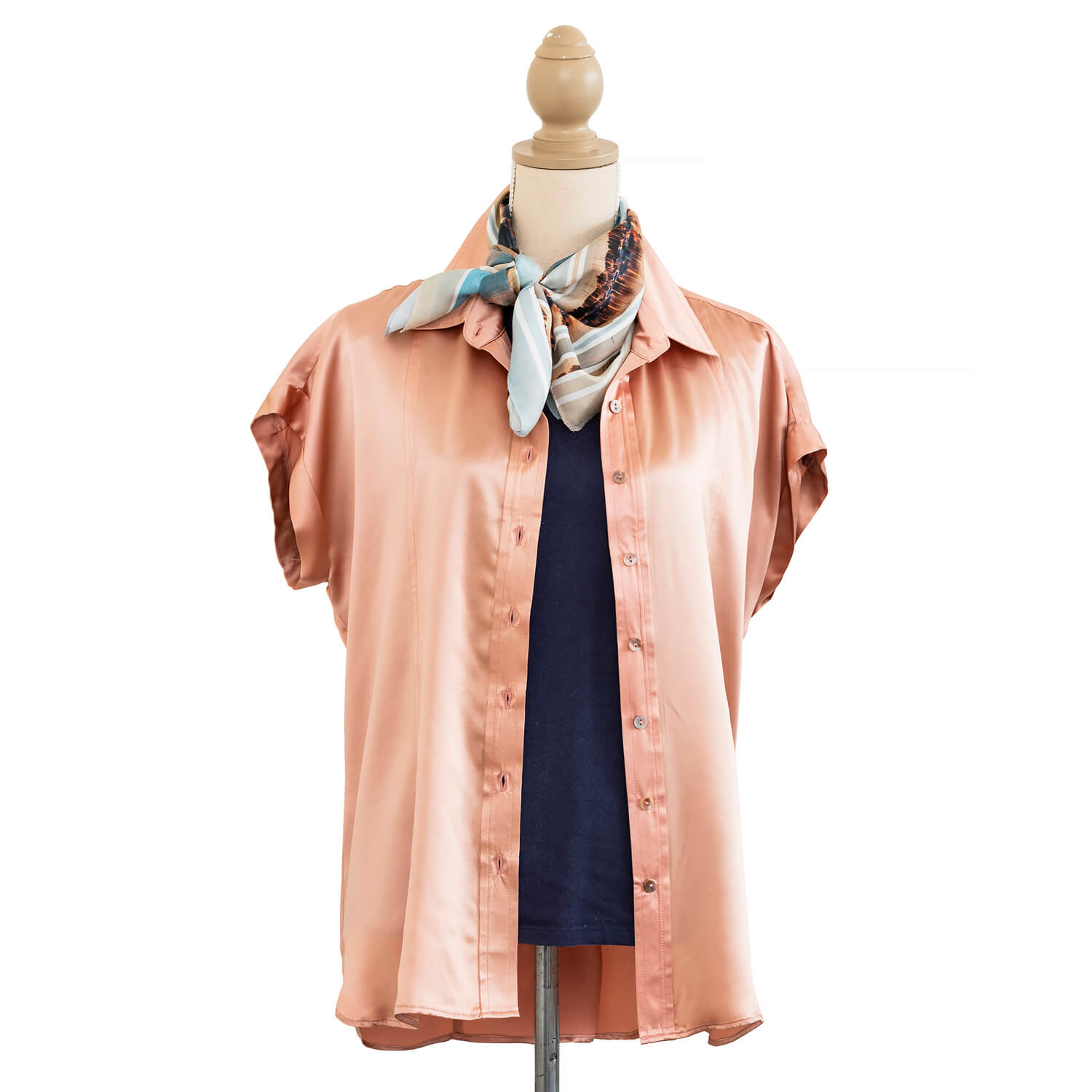 blush essential silk shirt worn open over navy top by seahorse silks