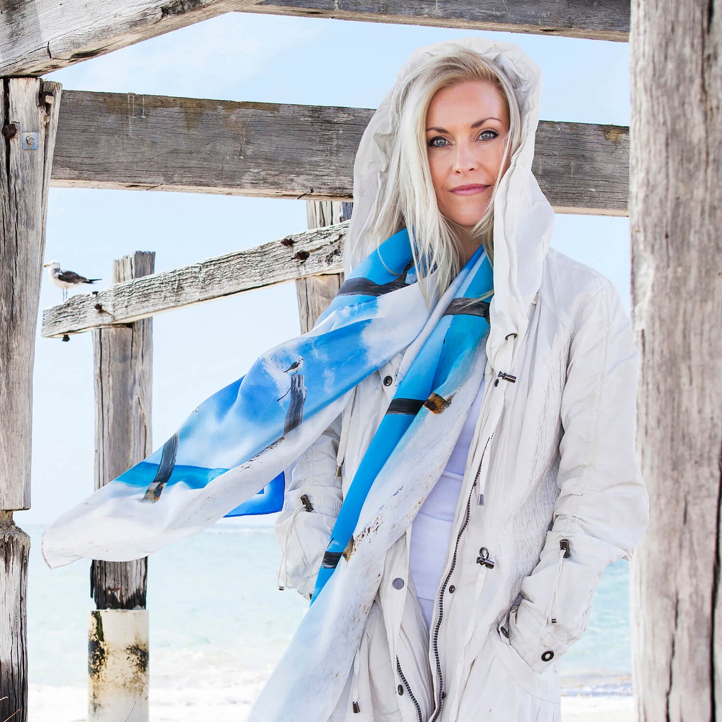 poles blue silk scarf with white coat