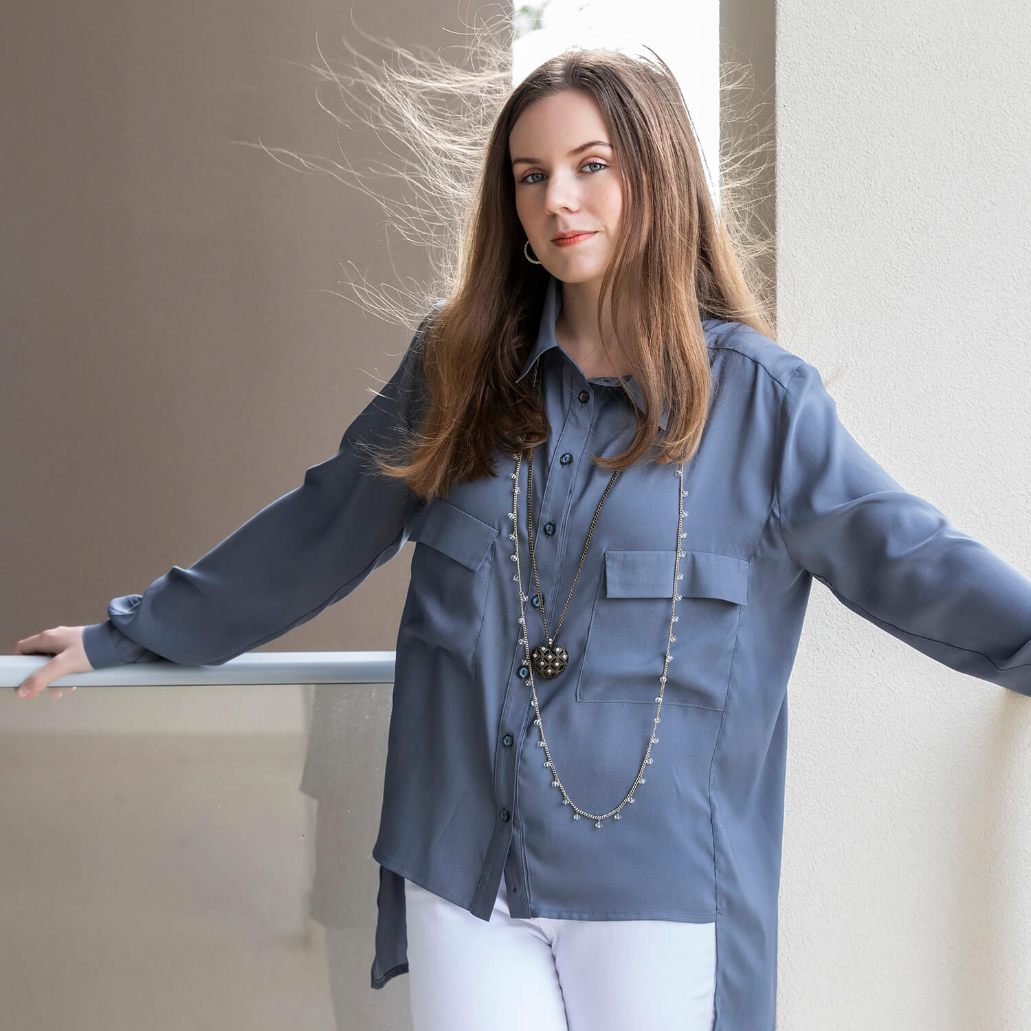 steel grey long sleeve shirt with white jeans by seahorse silks
